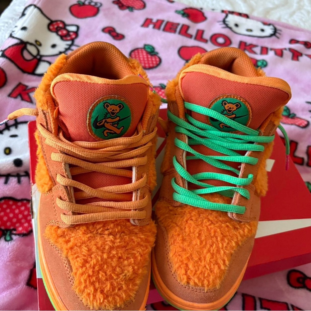 Nike Orange Sneakers with Colorful Bear Design